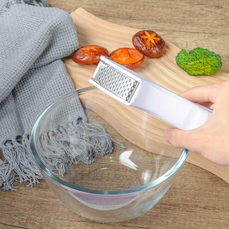 Garlic press for household use